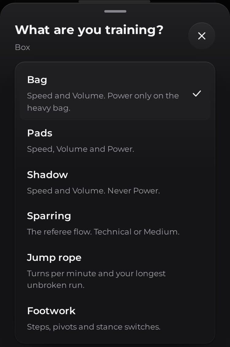 The session type screen of the PUMNO app, "What are you training?": Bag, Pads, Shadow, Sparring, Jump rope and Footwork, each with a one-line description.